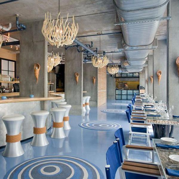 Epoxy Floor Installation With Embedded Medallions & Business Logo